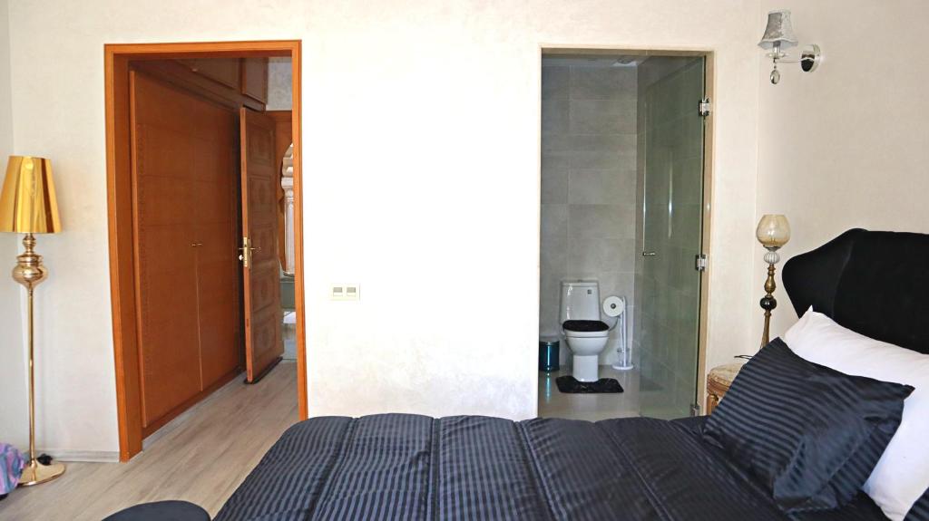 Postel nebo postele na pokoji v ubytování Barthélemy Guest House