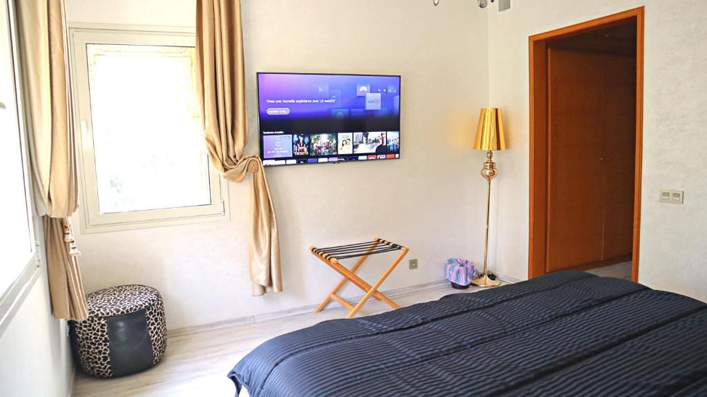 TV a/nebo společenská místnost v ubytování Barthélemy Guest House