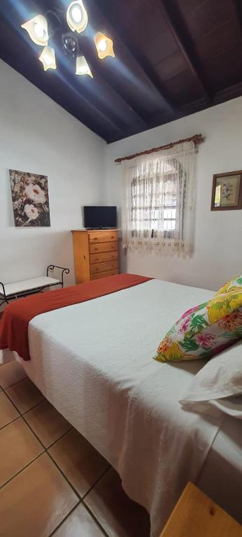 Postel nebo postele na pokoji v ubytování Casa Domingo Simón