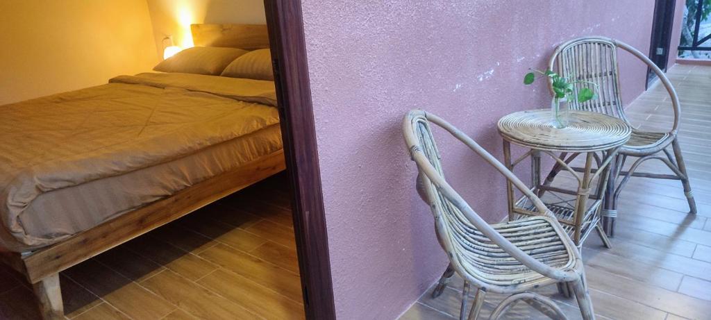 Postel nebo postele na pokoji v ubytování Care Rock Guesthouse