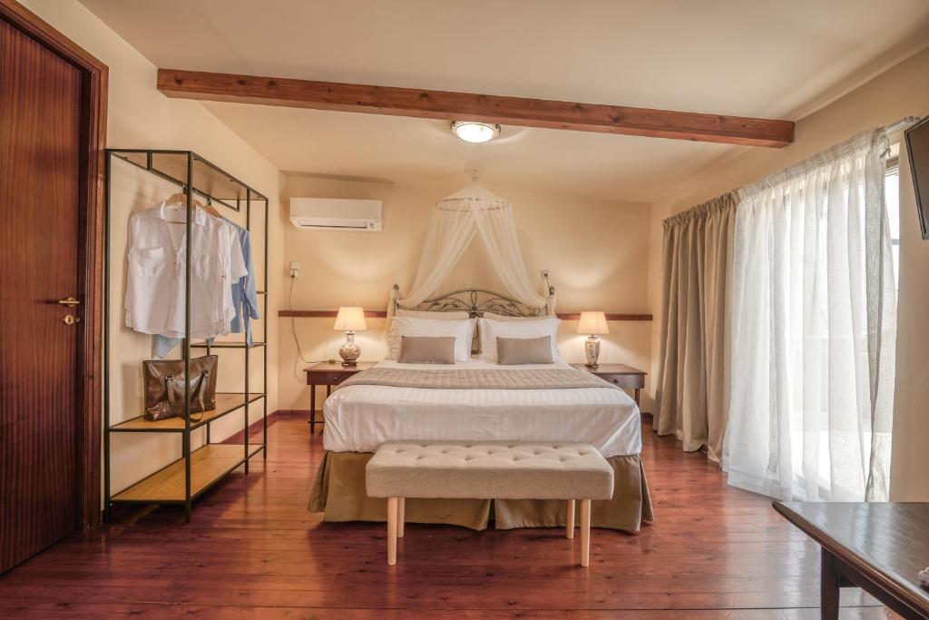 Postel nebo postele na pokoji v ubytování Kalliopi's Maisonette