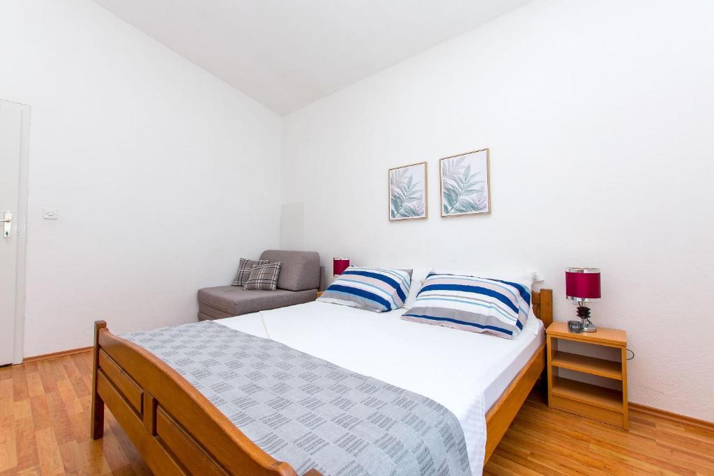 Posteľ alebo postele v izbe v ubytovaní Apartment Terezija