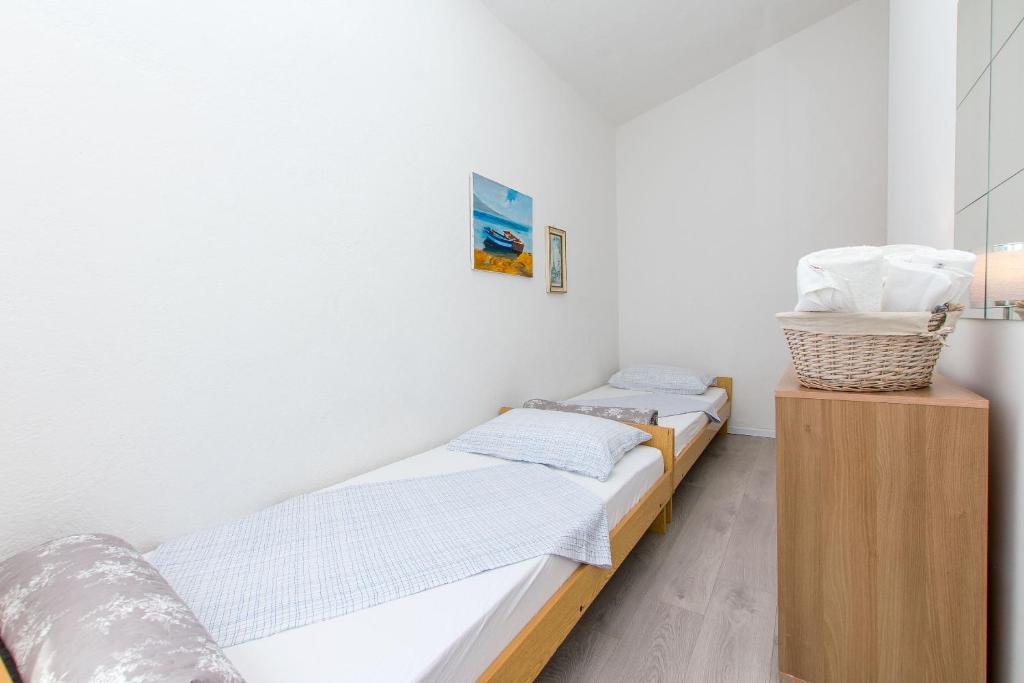 Posteľ alebo postele v izbe v ubytovaní Apartment Terezija