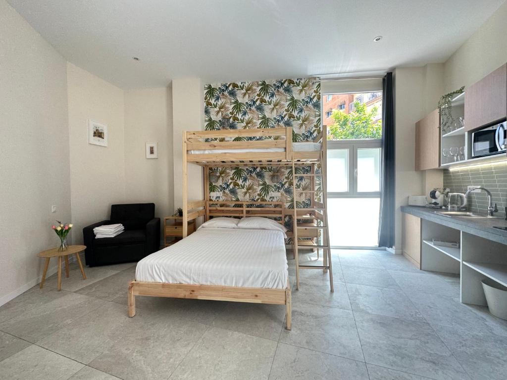 Postel nebo postele na pokoji v ubytování Calma Lofts