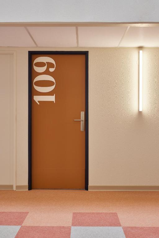 an office door with the word office on it at Hotel des Victoires - Restaurant in Cannes