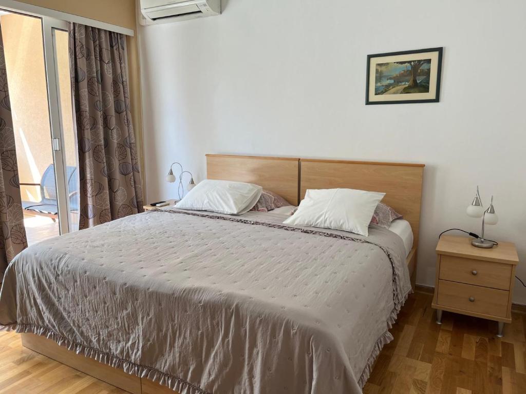 Postel nebo postele na pokoji v ubytování Room Novakovic