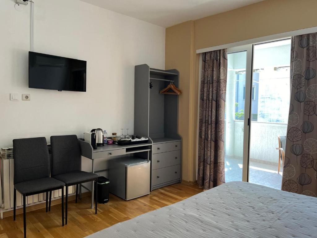 Kuchyň nebo kuchyňský kout v ubytování Room Novakovic