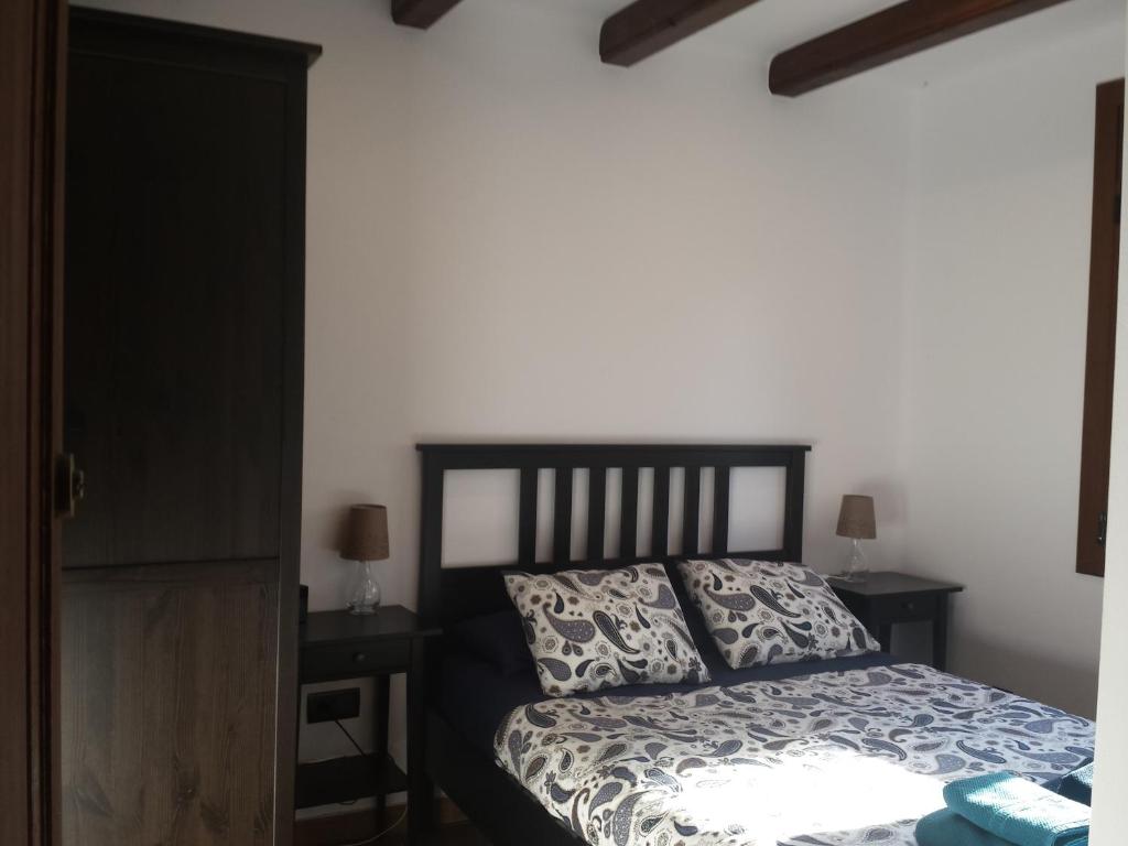 Postel nebo postele na pokoji v ubytování Casa Climent