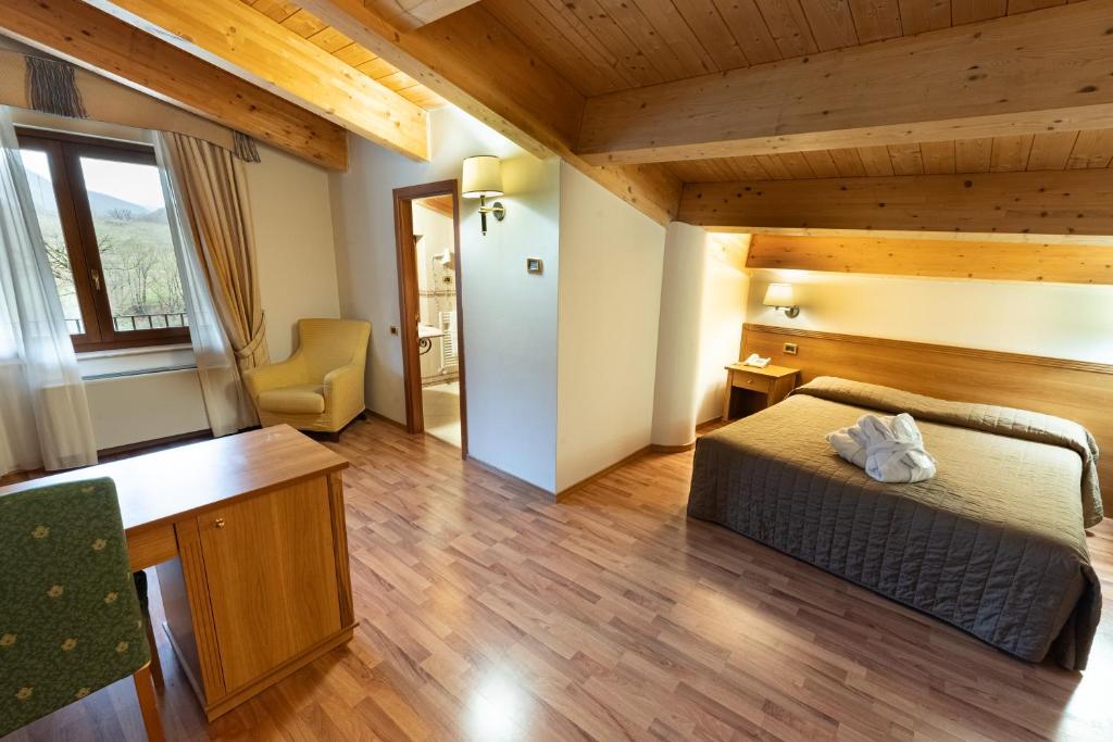 Cama o camas de una habitación en Grand Hotel Elite