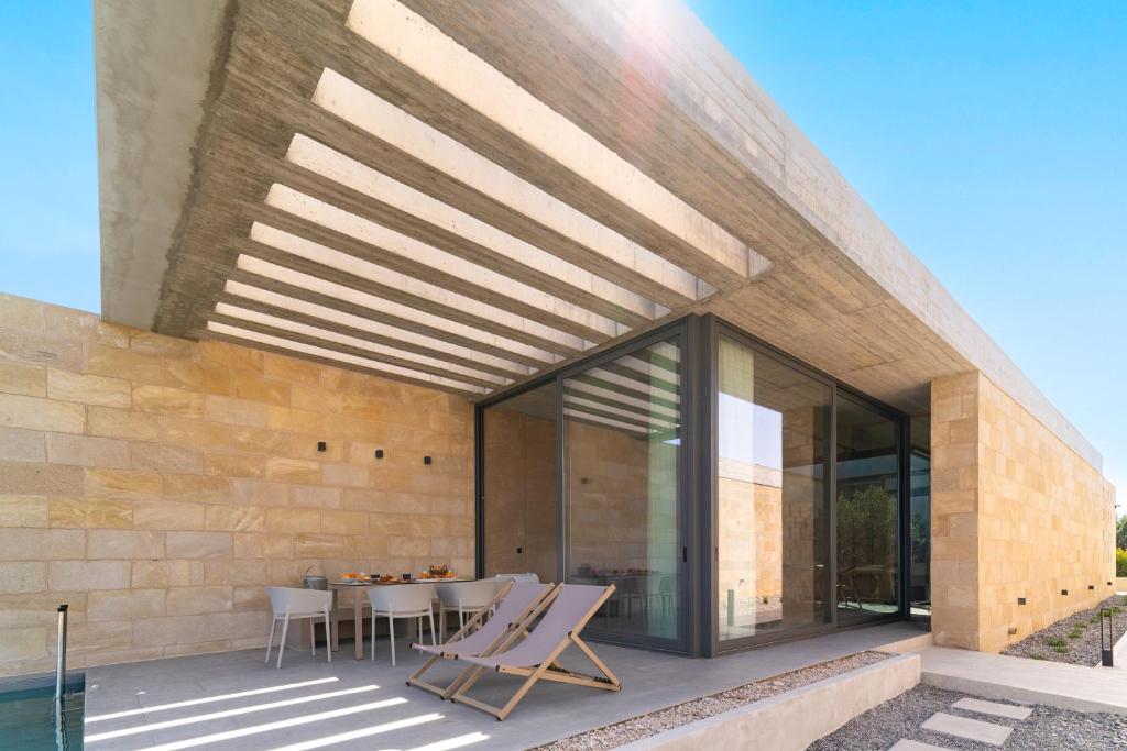 Fotografie z fotogalerie ubytování Linear Cabanon Kallithea Luxury Villas v destinaci Koskinou