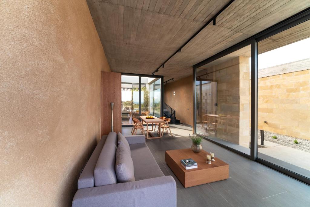 Posezení v ubytování Linear Cabanon Kallithea Luxury Villas