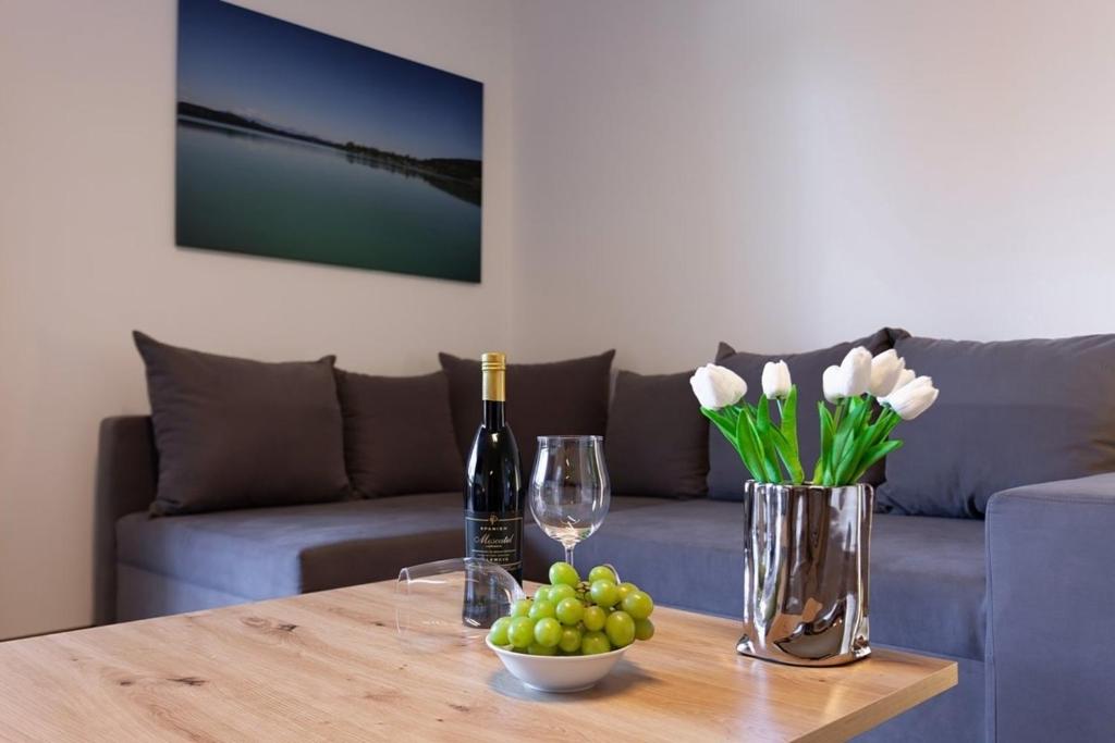 Posezení v ubytování Alpenlodge Lechbruck Allgäu - Ferienwohnung 18