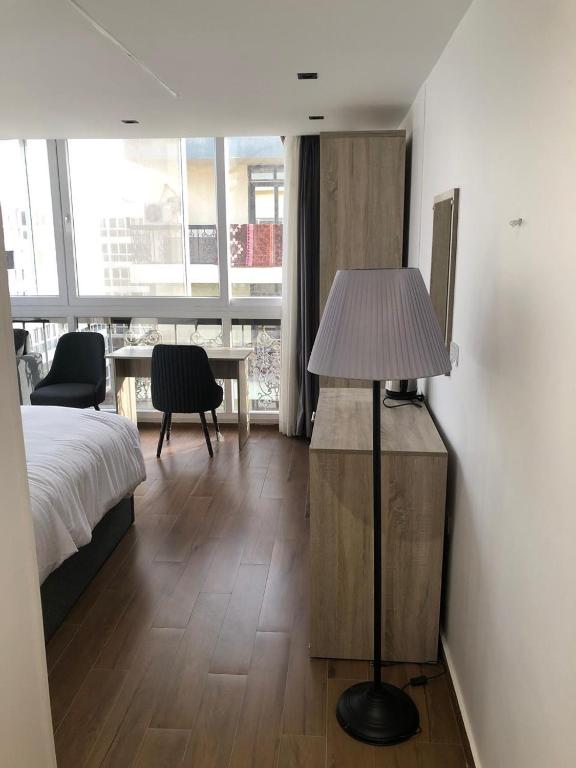 Postel nebo postele na pokoji v ubytování الحصرى Elhosary otel