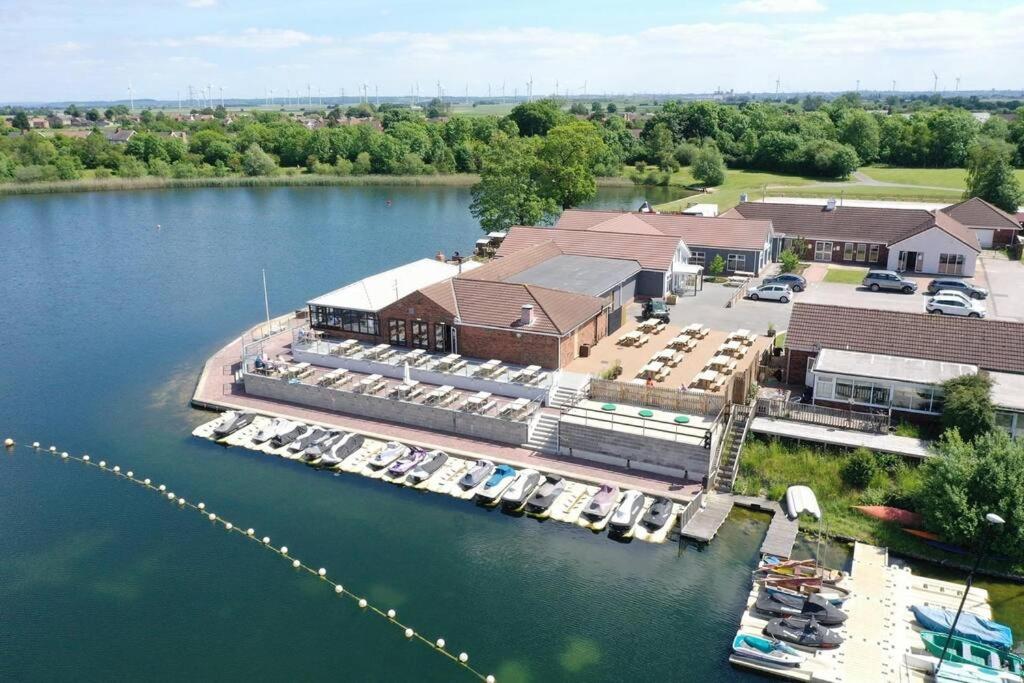 an aerial view of a marina with boats in the water at Royal Ascot Holiday Home - 5 Star Country Park - Bar - Restaurant - Fishing Lakes - Ice Cream Parlour - FREE Parking in Scunthorpe