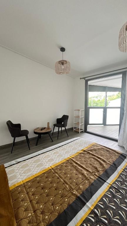 Postel nebo postele na pokoji v ubytování ATÈRLA - Appartement de charme et spa