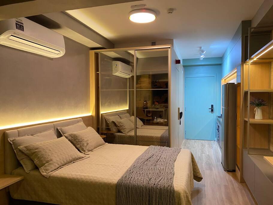 Postel nebo postele na pokoji v ubytování Flat de Luxo em Pinheiros Faria Lima