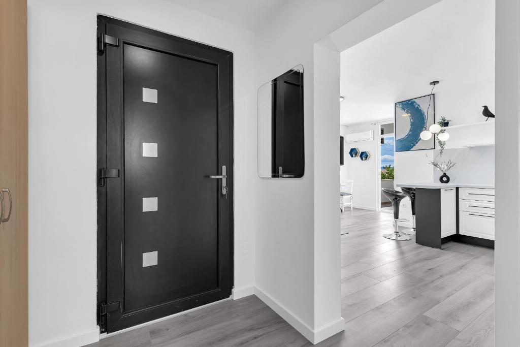 Kuchyňa alebo kuchynka v ubytovaní Apartman Bokšić 2