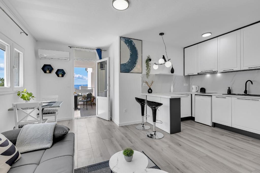 Kuchyňa alebo kuchynka v ubytovaní Apartman Bokšić 2