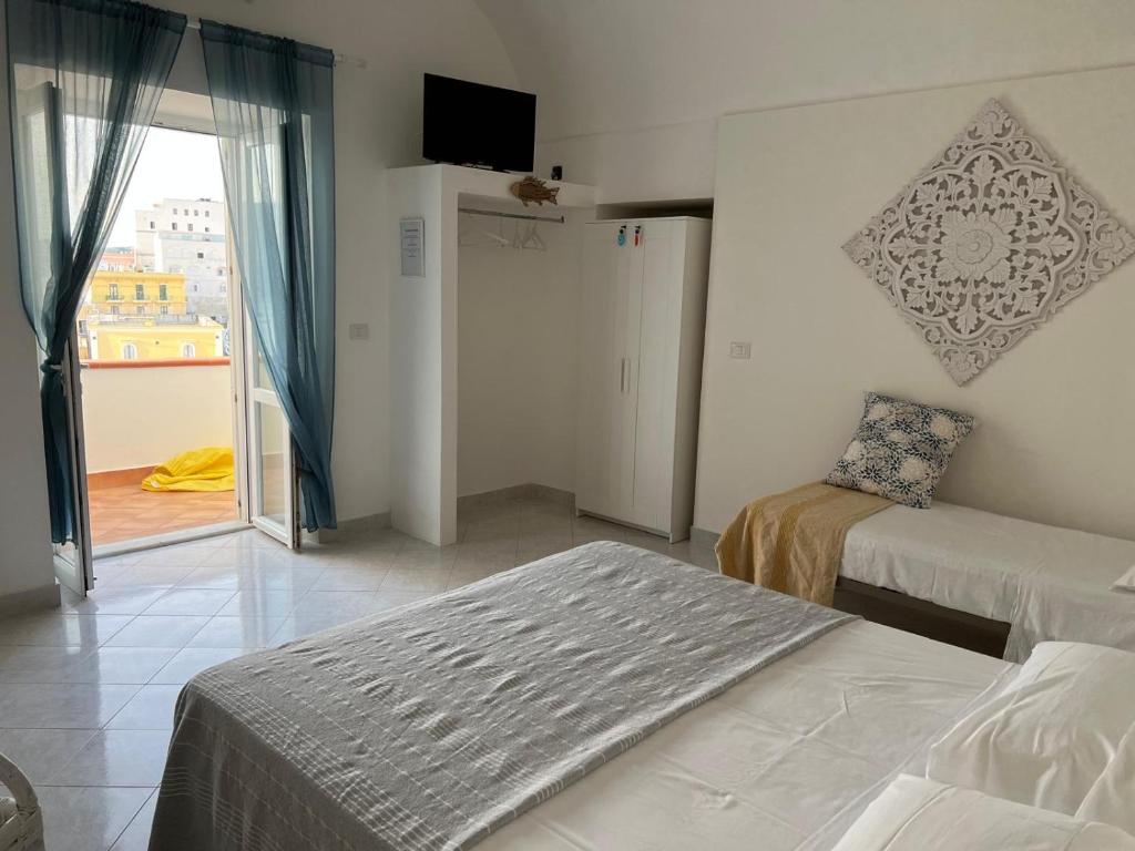 Postel nebo postele na pokoji v ubytování La Casa di Conny