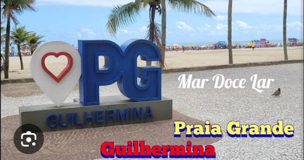 a sign for the rpi sign at the beach at Praia Guilhermina Sol Mar in Praia Grande