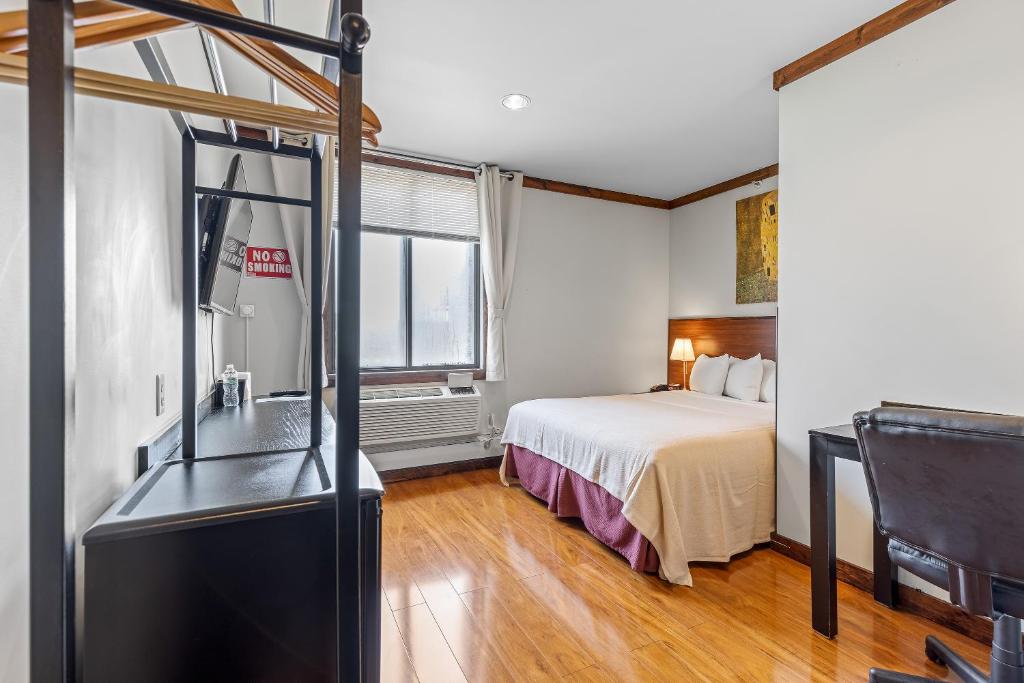 Postel nebo postele na pokoji v ubytování LIC Hotel