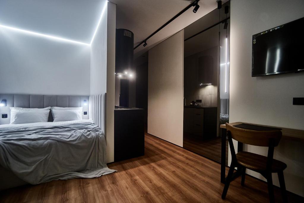 Postel nebo postele na pokoji v ubytování Apart Hotel Acropolis