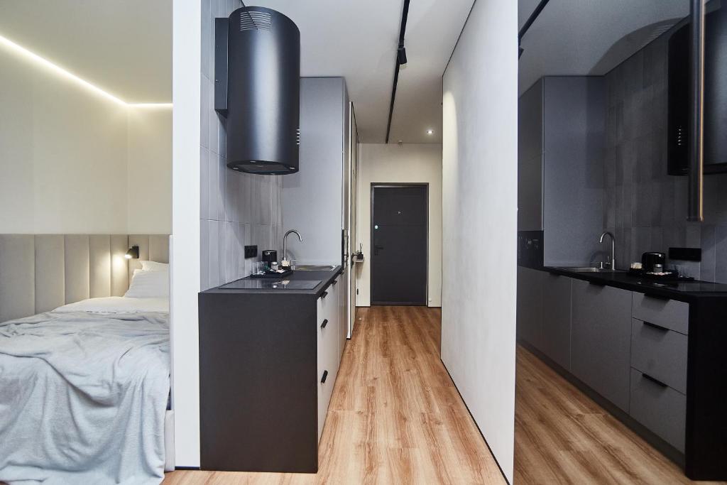 Postel nebo postele na pokoji v ubytování Apart Hotel Acropolis