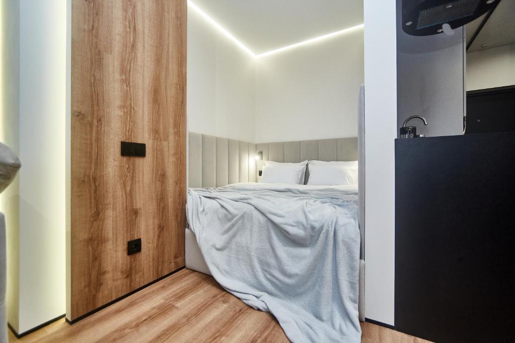 Postel nebo postele na pokoji v ubytování Apart Hotel Acropolis