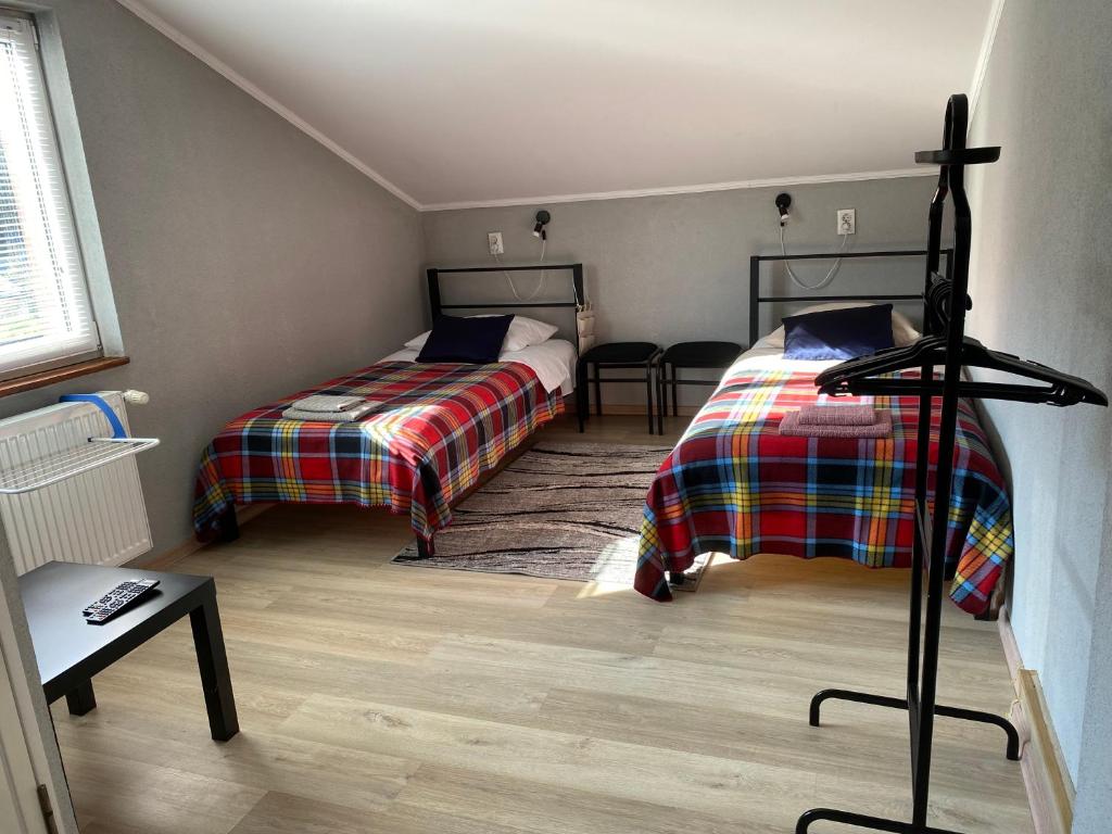 Postel nebo postele na pokoji v ubytování Mini-Hotel Serpanok