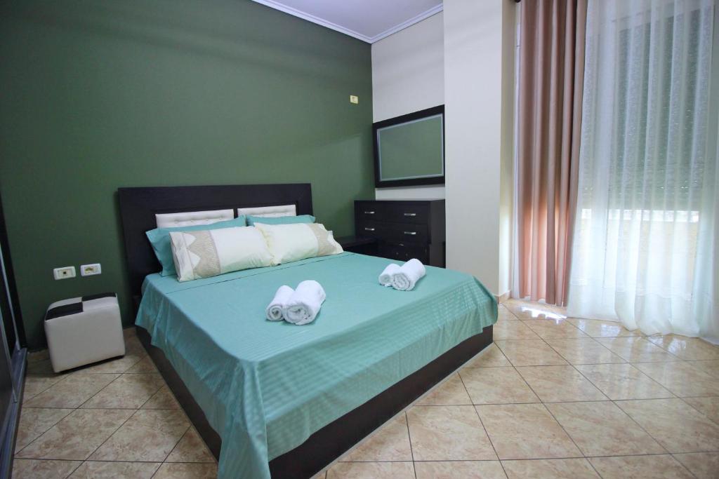 Uma cama ou camas num quarto em Apartament 47