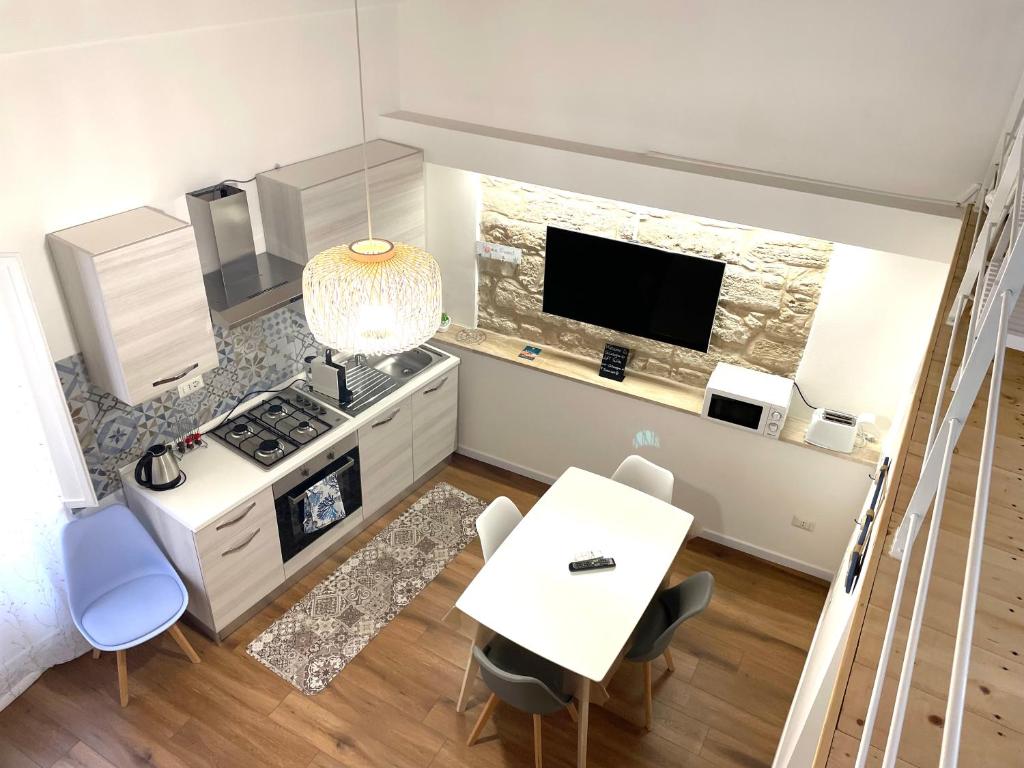 Kuchyň nebo kuchyňský kout v ubytování Catalogna10 Loft Suite