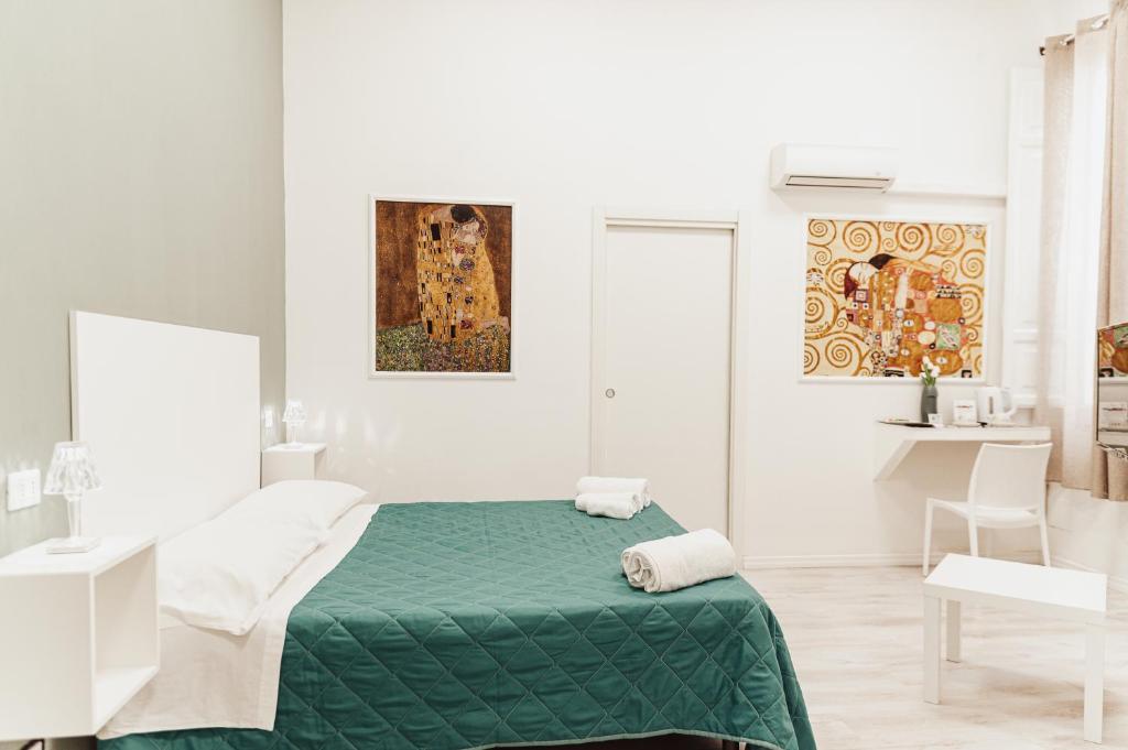 Postel nebo postele na pokoji v ubytování B&B Art
