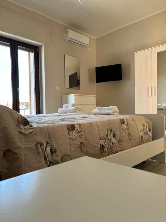 TV a/nebo společenská místnost v ubytování Borgo albergo vulturis