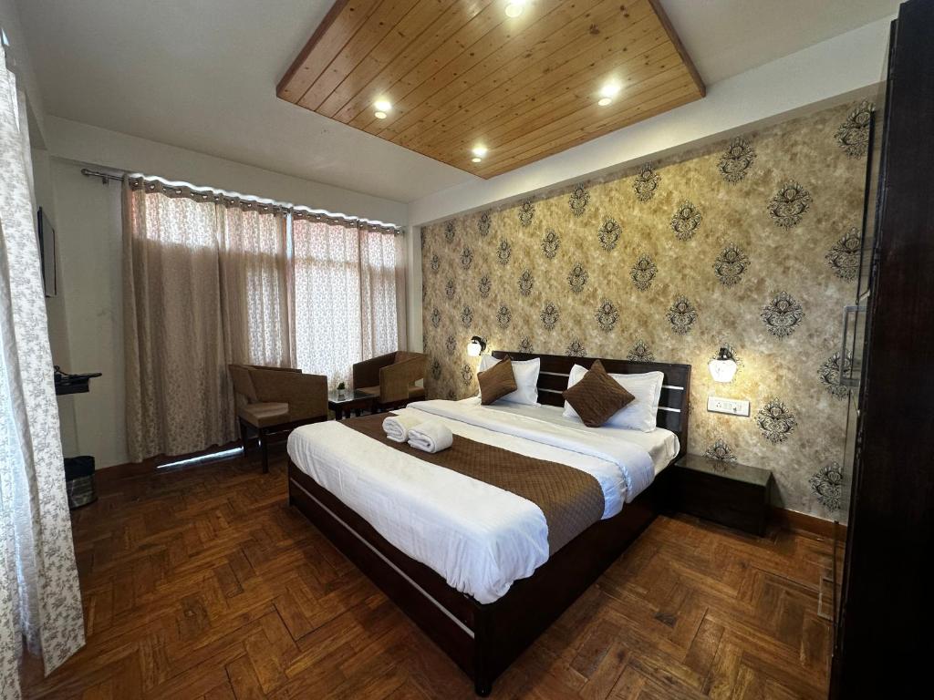Ένα ή περισσότερα κρεβάτια σε δωμάτιο στο Tara Cottages