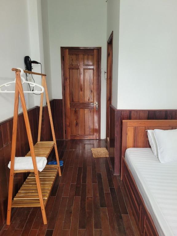 Postel nebo postele na pokoji v ubytování Hostel Ngọc Liên