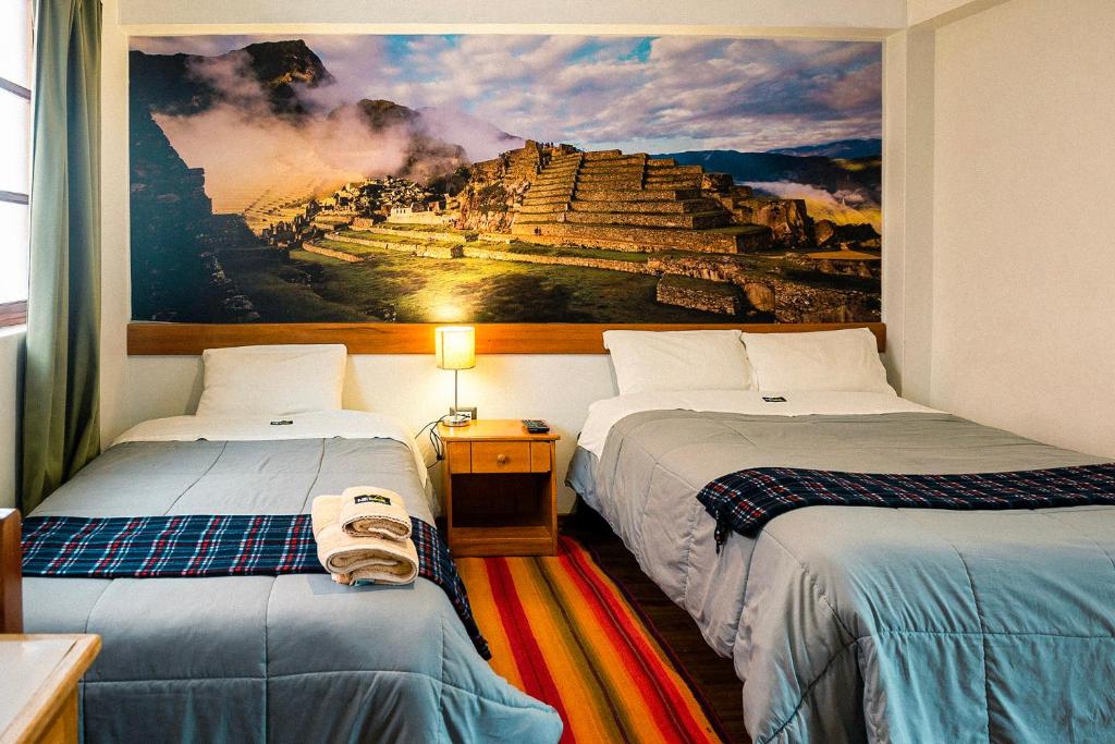 Letto o letti in una camera di Net House Cusco