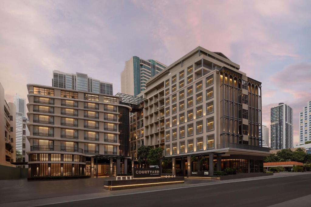a rendering of a building in a city at Courtyard by Marriott Bangkok Sukhumvit 20 in Bangkok