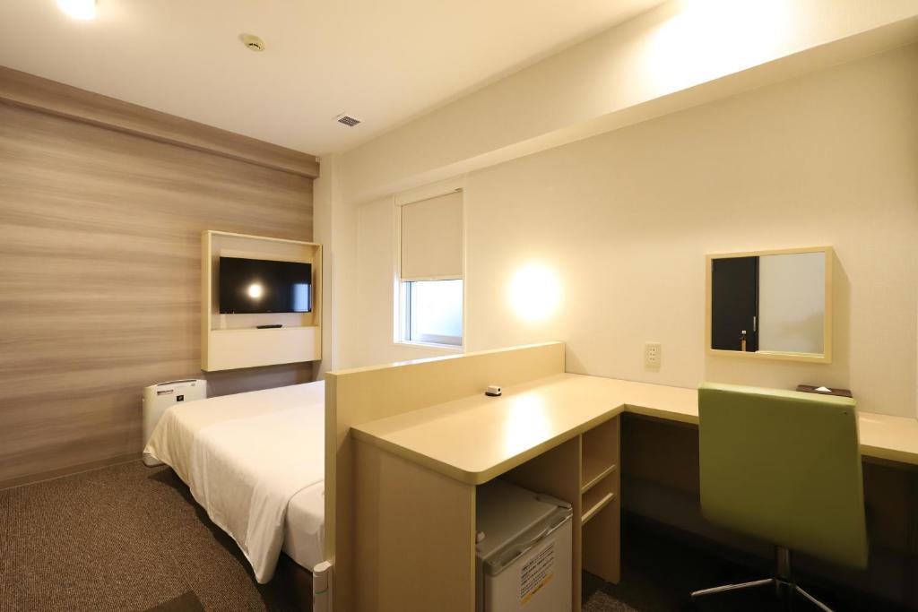 TV a/nebo společenská místnost v ubytování Smile Hotel Osaka Tennoji
