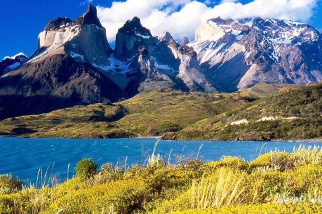 a mountain range with a lake in front of it at Casa en El Calafate, centro in El Calafate