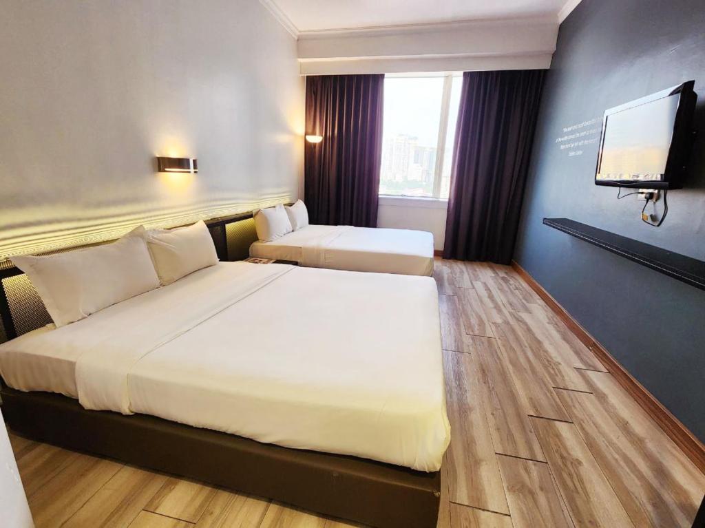 Katil atau katil-katil dalam bilik di Hotel Sentral Pudu @ City Centre / Bukit Bintang