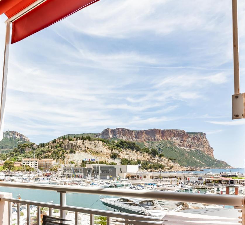 a view of a marina from the balcony of a boat at Le Bel Ecrin par Dodo-a-Cassis in Cassis