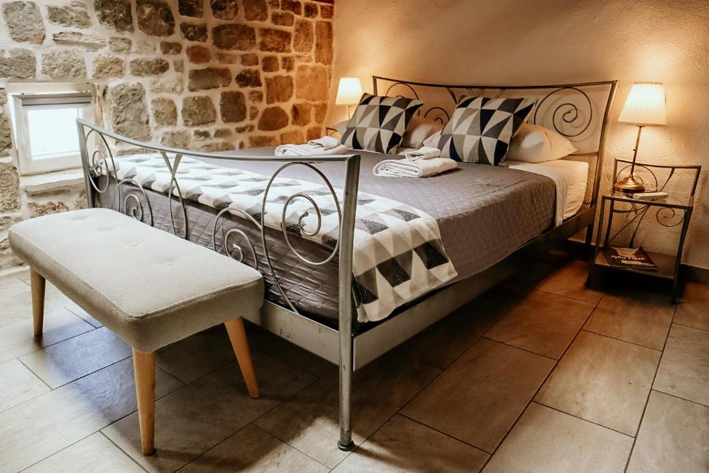 Posteľ alebo postele v izbe v ubytovaní City Rooms Šibenik