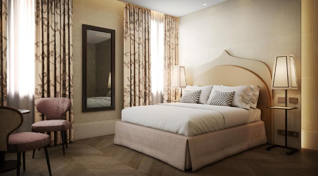 Postel nebo postele na pokoji v ubytování Albergo San Marco