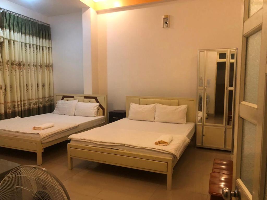 Posteľ alebo postele v izbe v ubytovaní Nam Dương 3 Hotel