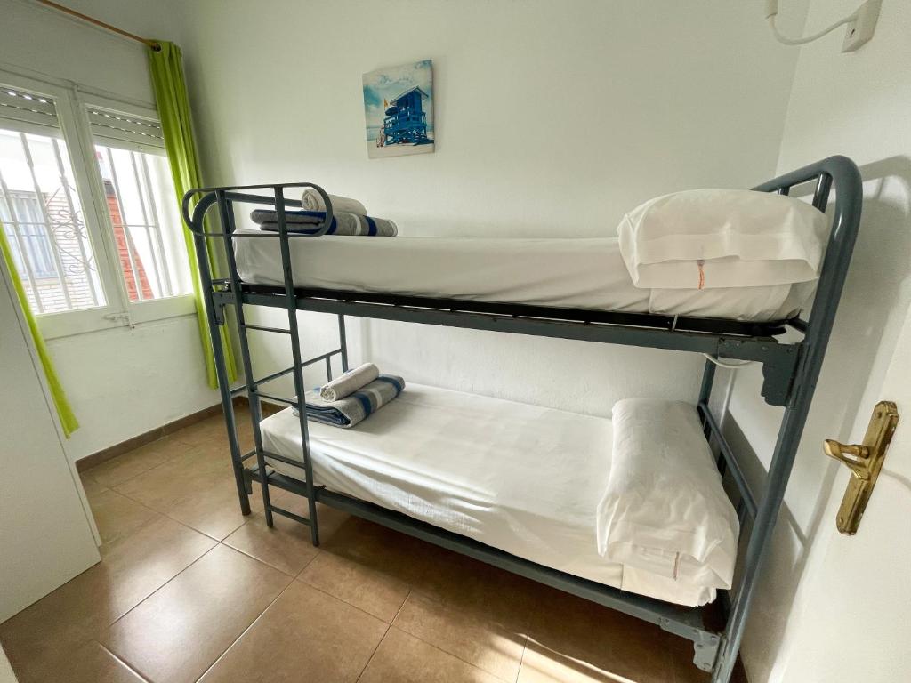 Posteľ alebo postele v izbe v ubytovaní Bungalows Pescador 3000