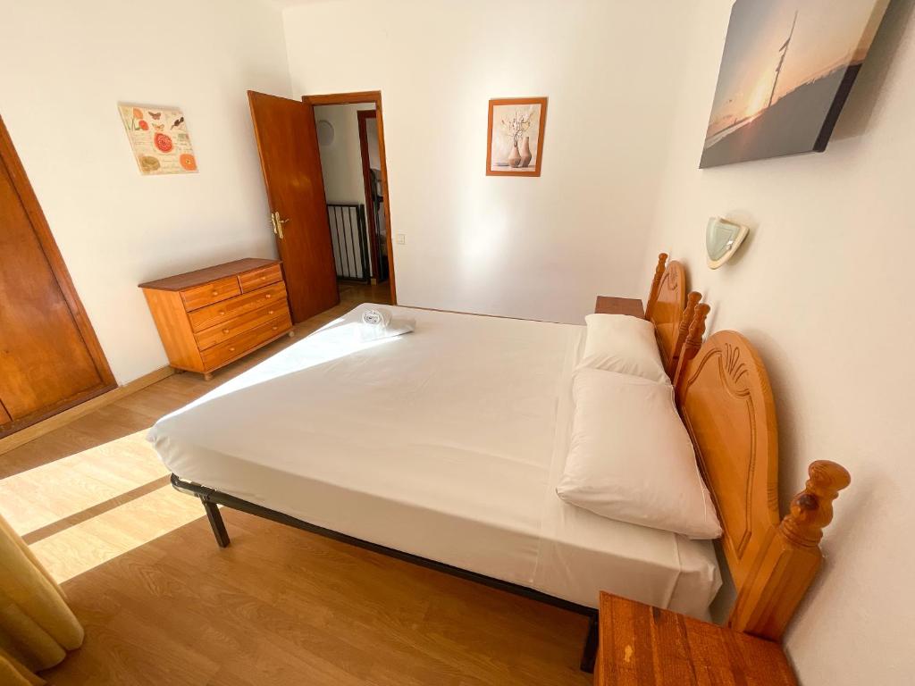 Posteľ alebo postele v izbe v ubytovaní Bungalows Pescador 3000