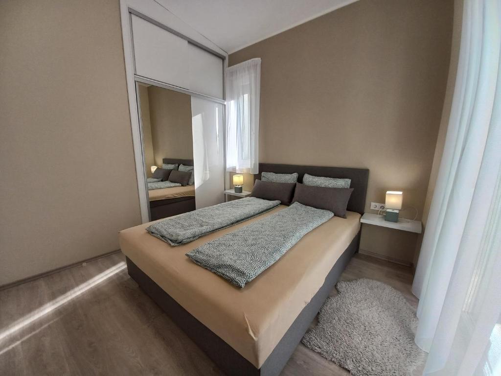 Posteľ alebo postele v izbe v ubytovaní Villa Bori Siófok