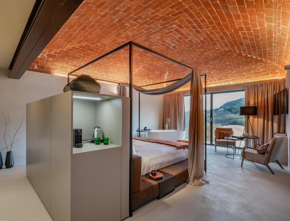 Postel nebo postele na pokoji v ubytování Relais Dal Cavaliere
