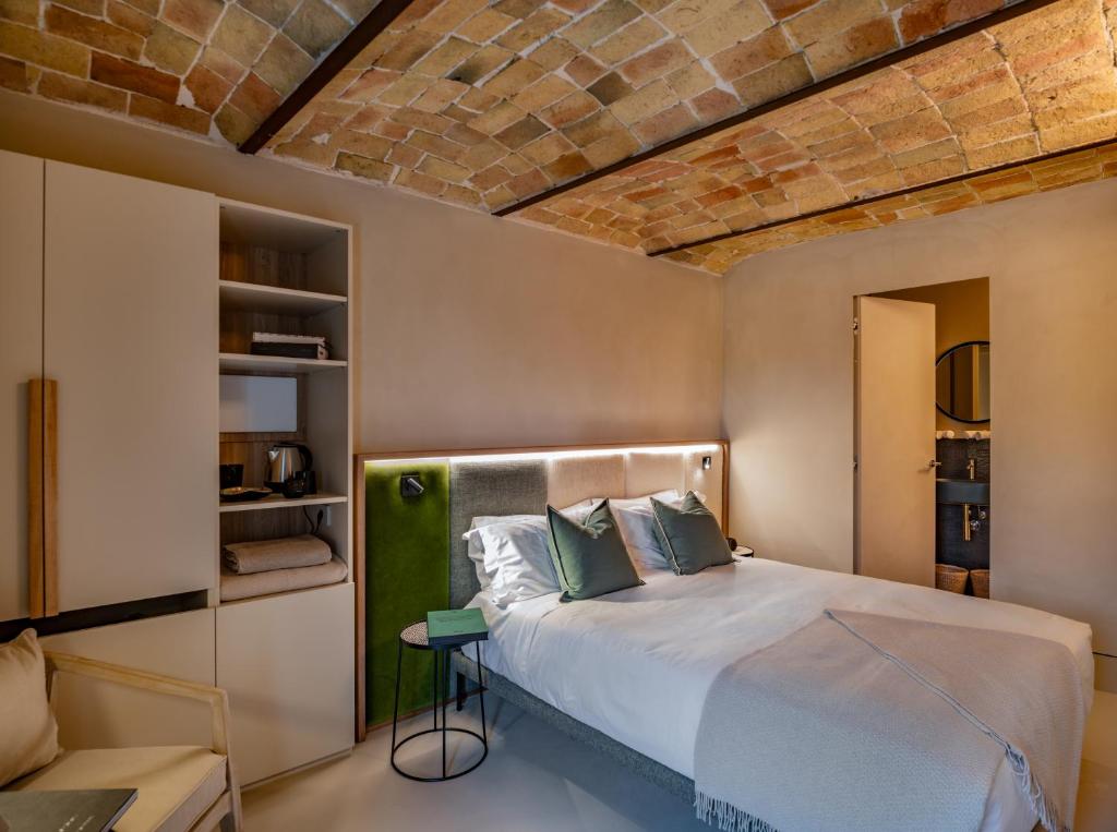 Postel nebo postele na pokoji v ubytování Relais Dal Cavaliere