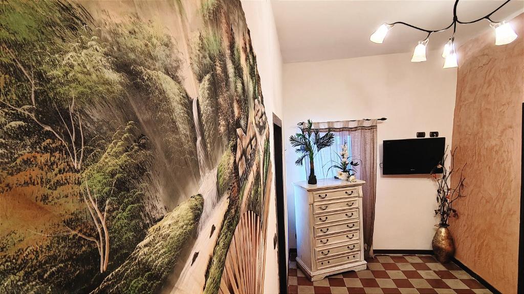 A television and/or entertainment centre at Ruggero House